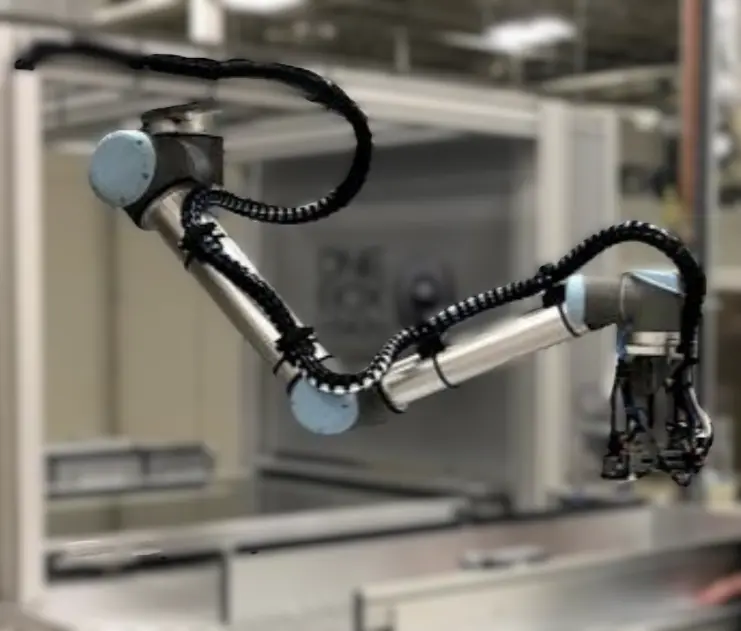 Industrial robot with integrated vision system